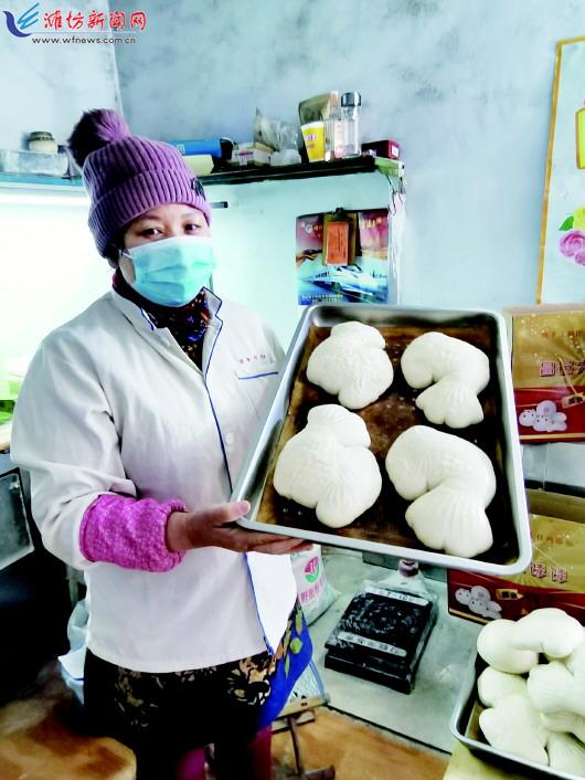 在城区北宫北街与向阳路交叉口附近有一家经营昌邑大饽饽的小店,数年